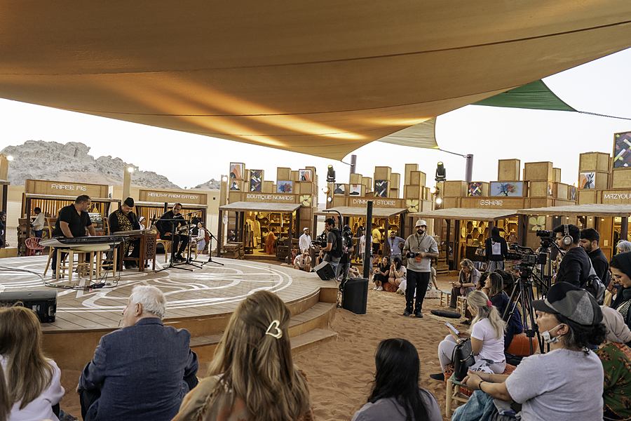 Audience gathered for a talk at the marketplace