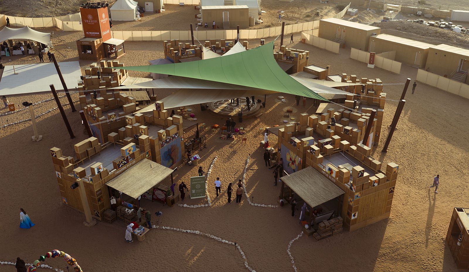 The marketplace from above — aerial photograph of the built pallet architecture