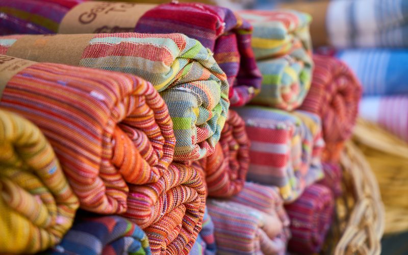 Rolled fabrics stacked for sourcing